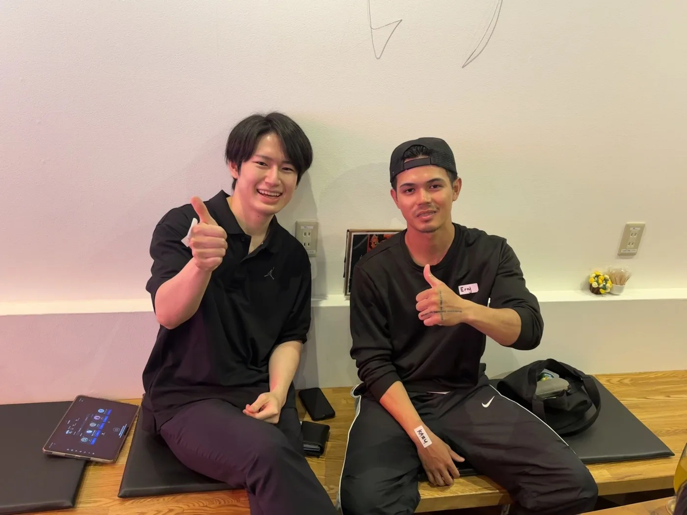 Two members of the Fukuoka international meetup at the café in Hakata